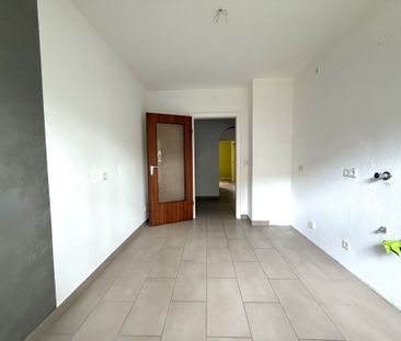 Gemütliche Erdgeschosswohnung mit Balkon | moderne Dusche und PKW-S... - Foto 1