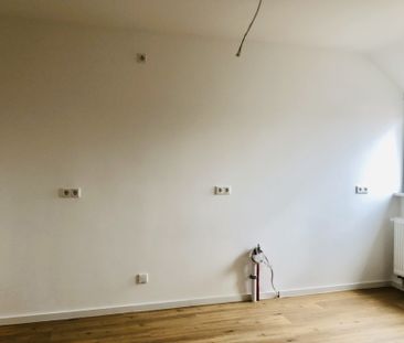 Sanierte Dachgeschosswohnung direkt in der Innenstadt - Foto 1