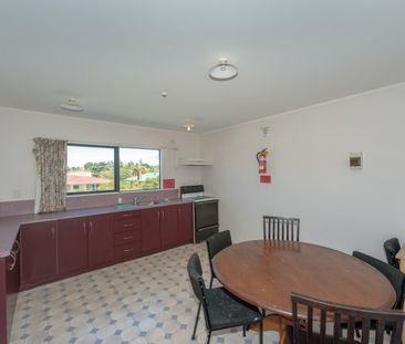 This furnished studio unit includes an ensuite bathroom and a small... - Photo 3
