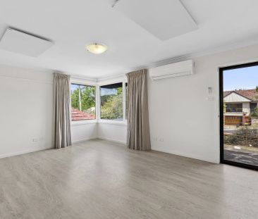 3 bedroom renovated home plus a studio + bathroom at the rear of th... - Photo 1