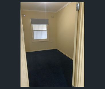 Tidy 3 Bedroom Home with Enclosed Yard - Photo 1