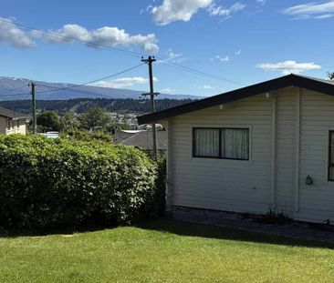 Spacious Family Home with Versatile Living Options - Photo 3