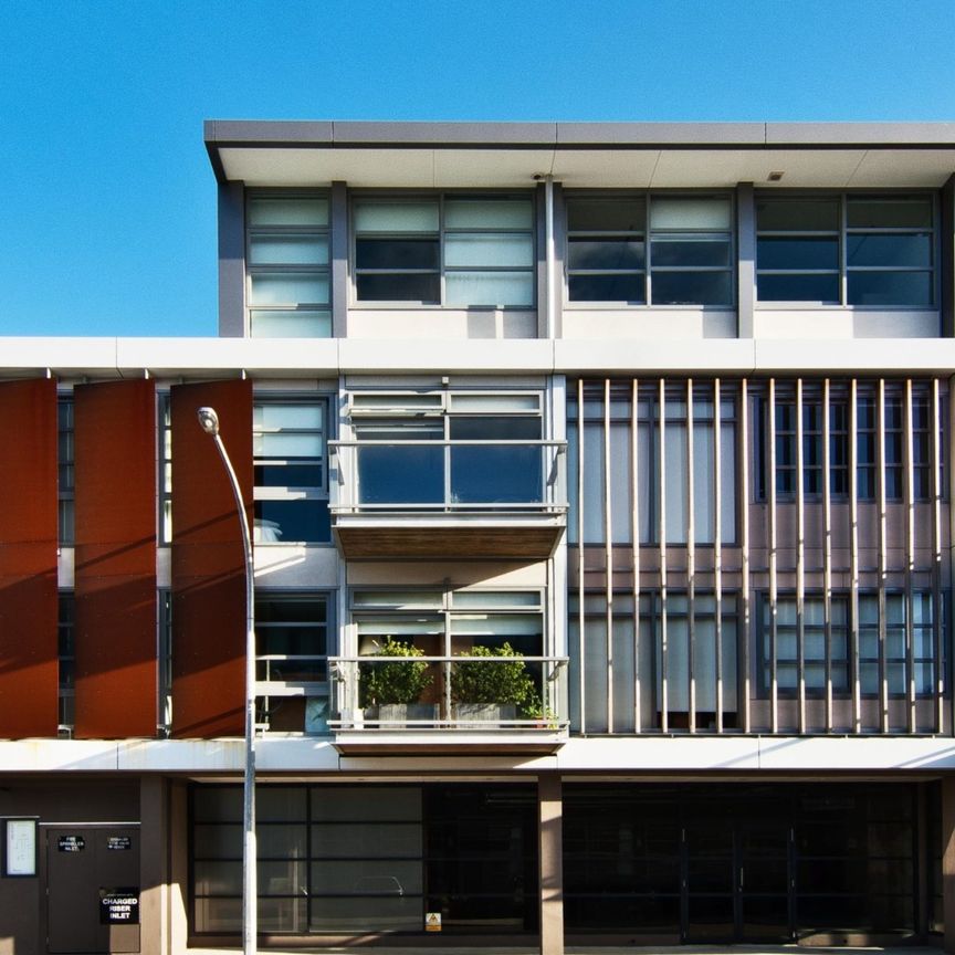 Welcome to apartment E204A in Revolucion Apartments. - Photo 1