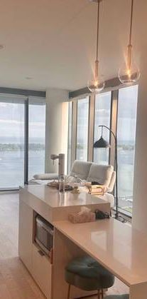 2 BDRM CORNER UNIT WITH UNOBSTRUCTED LAKE VIEWS IN THE MONDE! - Photo 1