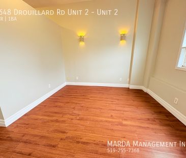 NEWLY RENOVATED 1-BEDROOM/1-BATH MAIN FLOOR SUITE +HYDRO - Photo 3