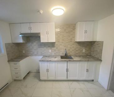 Luxueux 3 ½ Neuf à Louer – Anjou – Avec Stationnement Privé - Photo 1