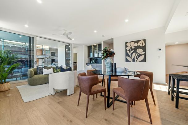 Brand New Luxury Coastal Tri-level Townhome with Private Lift & Italian Finishes - Photo 1