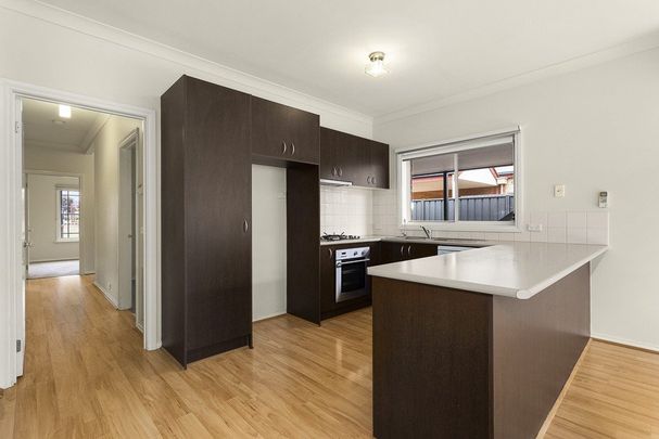 Bright and Spacious Family Home in Prime Location - Photo 1