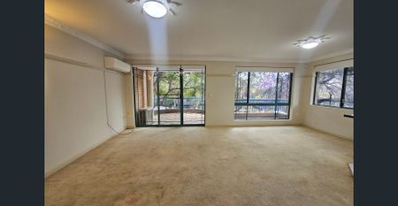 Spacious North Facing Top Level Residence With Lockup Garage and Plenty of Natural Light - Photo 4