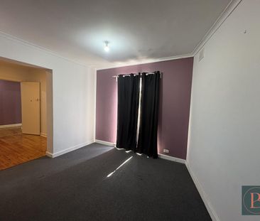 Spacious 4 Bedroom Home with Multiple Living Areas - Photo 3