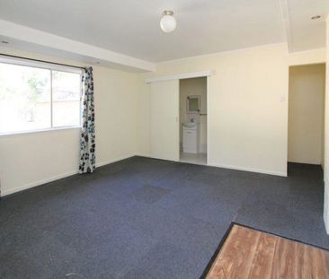 Deceptively Spacious Family Home with Multiple Living Areas - Photo 2