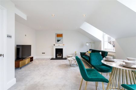 An impressive, modern two bedroom maisonette situated on the 3rd and 4th floors of this period building on the Chelsea/Earls Court borders. Council Tax Band F | EPC rating: D - Photo 4