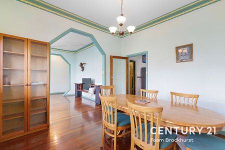 Charming 1950s Home with Modern Flexibility & Pristine Gardens! - Photo 4