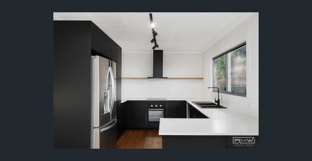 Stylish, Low-Maintenance Unit in a Prime Location - Photo 4