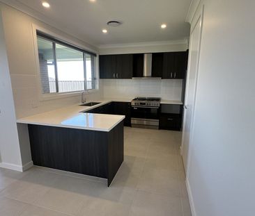 Brand New 4 Bedroom Home for Lease! - Photo 6
