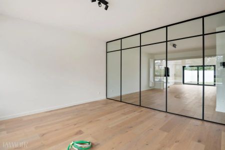 Ruime gezinswoning met tuin en polyvalente bureauruimte in Mechelen. - Photo 4
