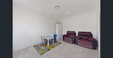 Beautiful 4-Bedroom Family Home with Pool in Prime Boondall Location - Photo 2