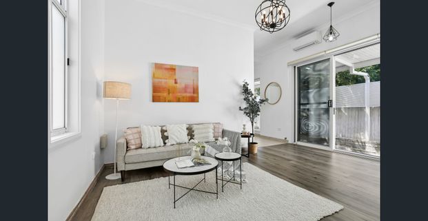 Charming character residence on a prized tree-lined street - Photo 1