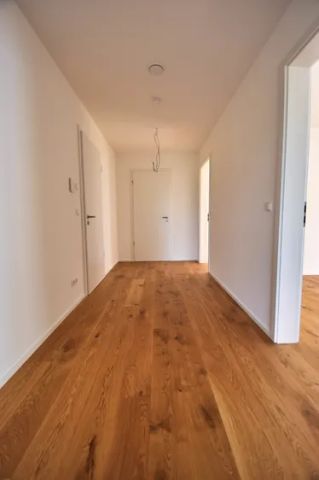 Exklusive Neubauwohnung mit Terrasse und Garten! 90qm, hochwertige Einbauküche, Parkett, Rolläden... - Photo 2