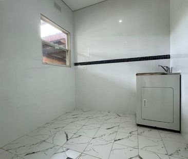 Modern&comma; Spacious Dual-Level Home&excl;&excl; - Photo 2