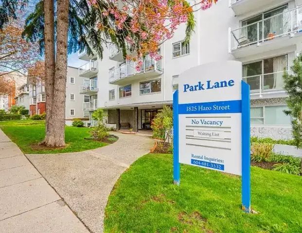 NEWLY RENOVATED CORNER 1 BEDROOM AVAILALBE WEST OF DENMAN | 1825 Haro Street, Vancouver - Photo 1