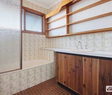 Charming 4-Bed, 2-Bath Home with Modern Upgrades & Spacious Backyard - Photo 4