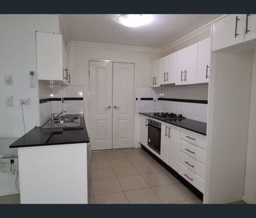 Beautiful 2-bedroom apartment + Tiled flooring + 2 Bathrooms!! - Photo 5