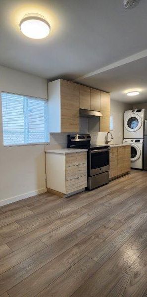 One Bedroom Ground Level Suite Including Utilities and One Parking Space - Photo 1