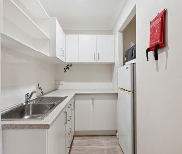 One bedroom flat with utilities & lawn mowing included - Photo 3