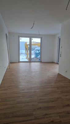 Erstbezug in Voxtrup: Exklusive 2ZKB EG-Wohnung mit Terrasse + Stellplatz im Neubau - Photo 1