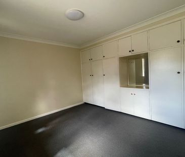 Brick 2-Bedroom Unit in Convenient Location - Photo 3