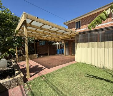NEWLY RENOVATED TOWNHOUSE - Photo 1