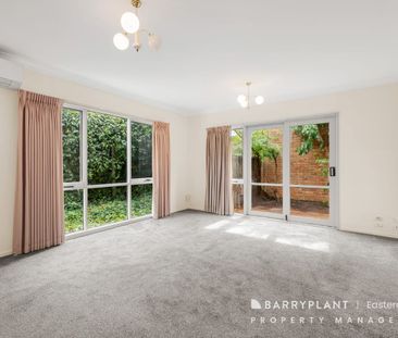 A Lovely 2 Bedroom Unit - Photo 1