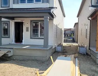 Spacious brand new End-Unit TownHouse in Carrington with attached double-garage | 41 Carringwood Close Northwest, Calgary - Photo 1