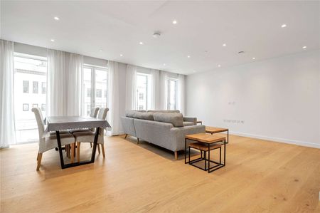 A furnished three bedroom apartment located on the fourth floor within Postmark. - Photo 4