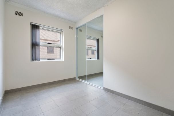RENOVATED 2 BEDROOM UNITS WITH CAR SPACE - Photo 1