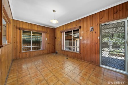 Charming three bedroom residence in ideal location -Six Month Lease - Photo 3