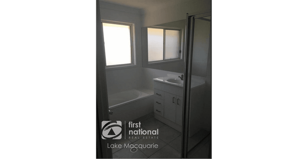 Modern 4-Bedroom Family Home - Photo 1