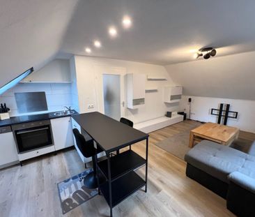 Modernisierte 2-Zimmer-Dachgeschosswohnung im Herzen von Brück! - Photo 1