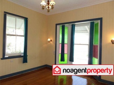 Spacious Four-Bedroom Queenslander with Timeless Charm in Clayfield - Photo 3