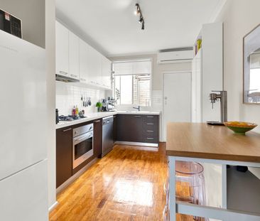 Updated Ground-Floor Villa Unit with Private Courtyard - Photo 2