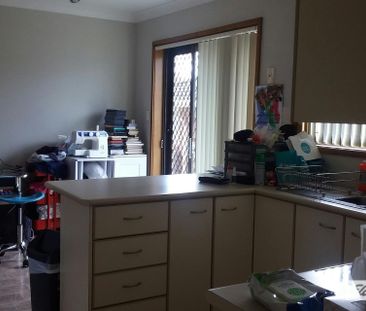 Charming 3 Bedroom Brick Home with Double Garage - Photo 4