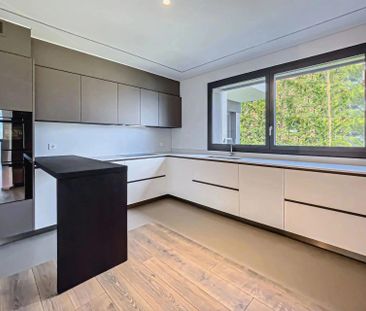 Montagnola: Moderne 5.5-Zimmer-Wohnung mit Privatgarten zu vermieten - Foto 4