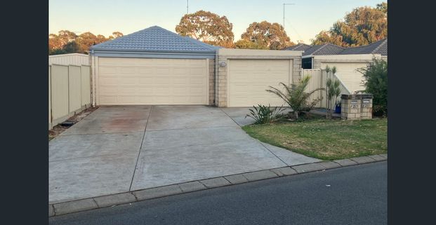 Charming, Secure 4-Bedroom, 2-Bathroom Home, Featuring Triple Garage with Extra Parking & Entertainer's Patio - Photo 1