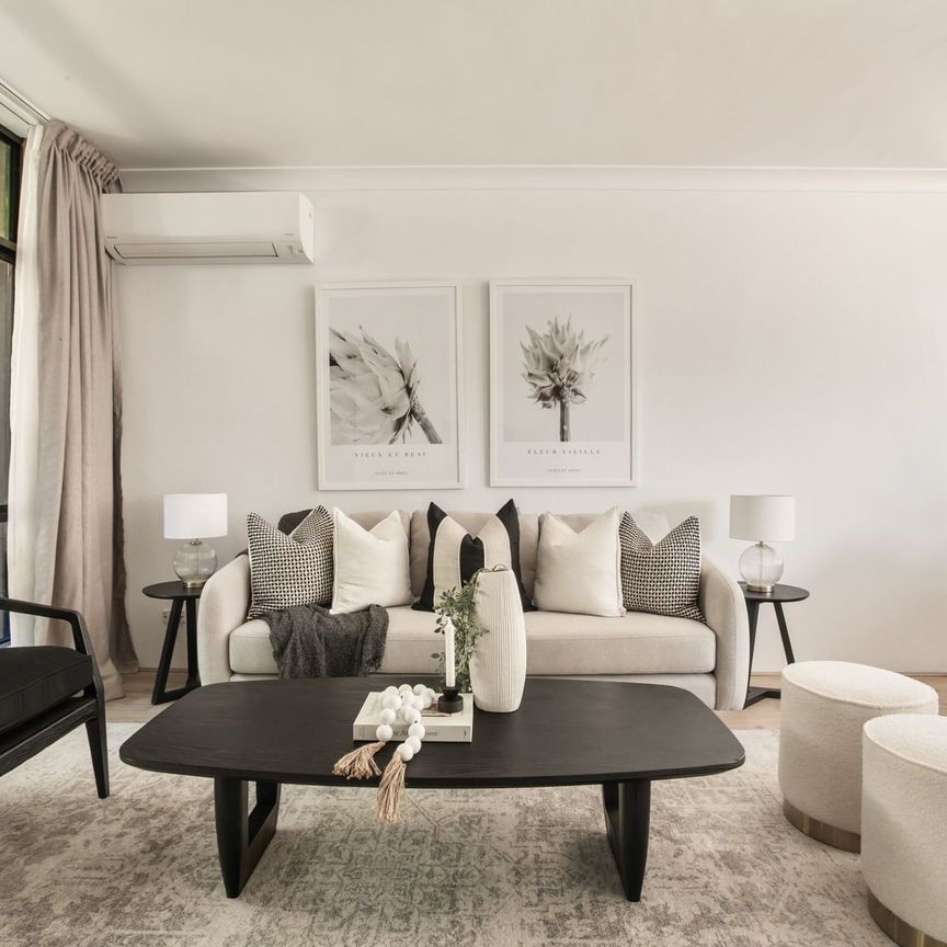 Three Bedroom Townhouse with Parking - Unfurnished - Photo 1