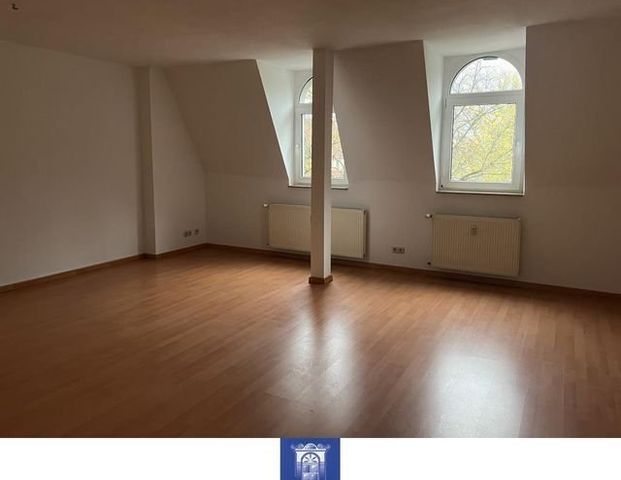 Perfekte Dachwohnung mit groÃem Balkon und tollen Blick in den grÃ¼nen Innenhof! - Foto 1