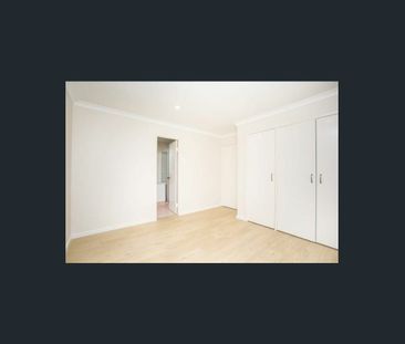 A Bright Three Bedroom Home with Its Own Courtyard - Photo 3