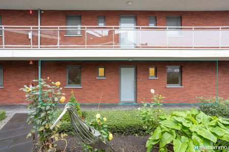 LICHTRIJK APPARTEMENT MET 2 SLAAPKAMERS EN PARKEERPLAATS AAN HET CENTRUM VAN BILZEN - Photo 2