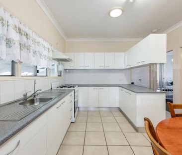 Immaculate Family Home with Shed and Fully Fenced Yard - Photo 6