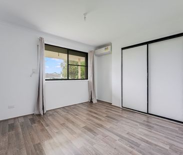 Four Bedroom Home with Spacious Entertaining Area - Photo 6